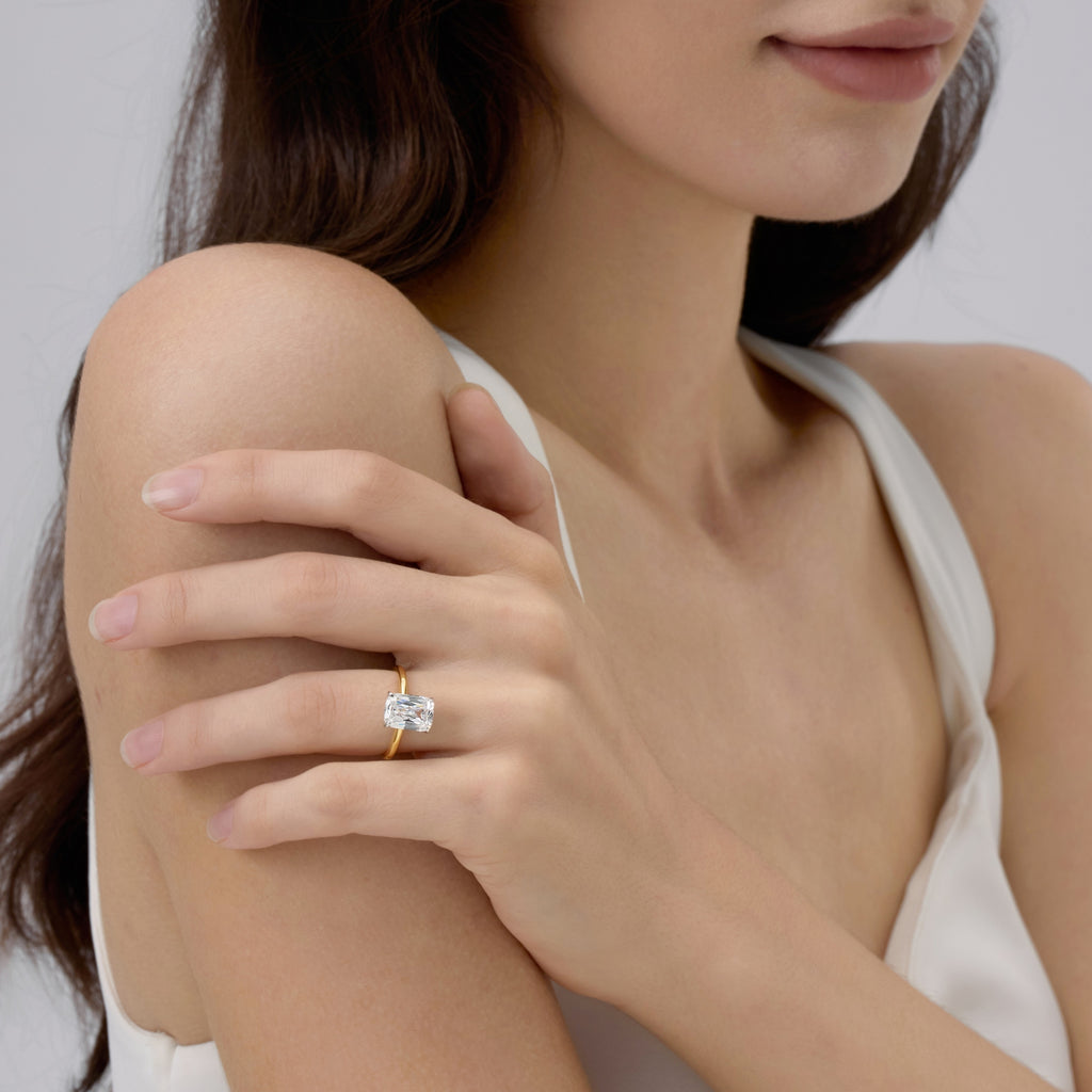 Woman wearing Club Lux 3 Carat Elongated Cushion Engagement Ring, vintage-inspired elegance