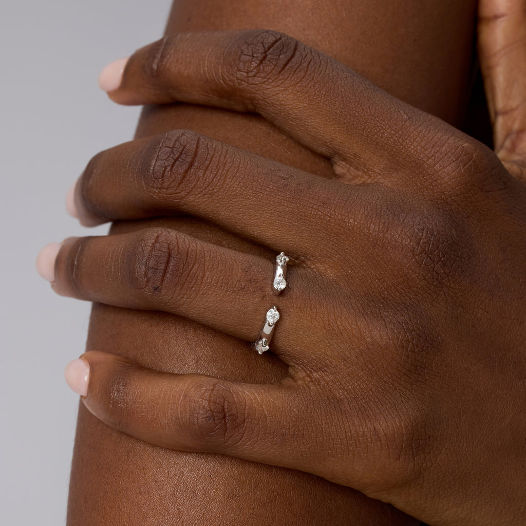 Front view of Club Lux Double Accented Stackable Open Band Ring worn on hand, rhodium plated 925 silver, cubic zirconia.