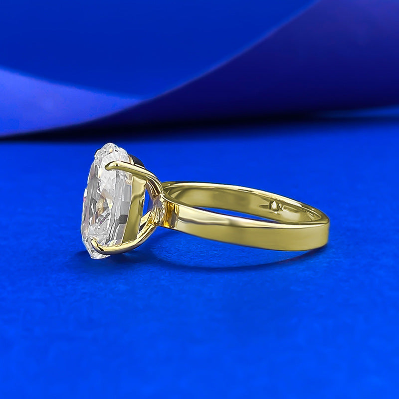 Side view of 3.5 Carat Oval Solitaire Engagement Ring highlighting four-prong setting and 3mm medium-width gold band | Club Lux