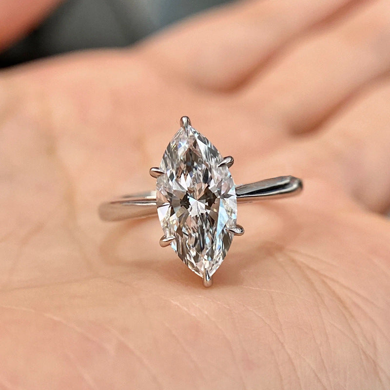3 Carat Marquise Solitaire Ring on hand – front angle highlighting the classic marquise cut and polished silver band
