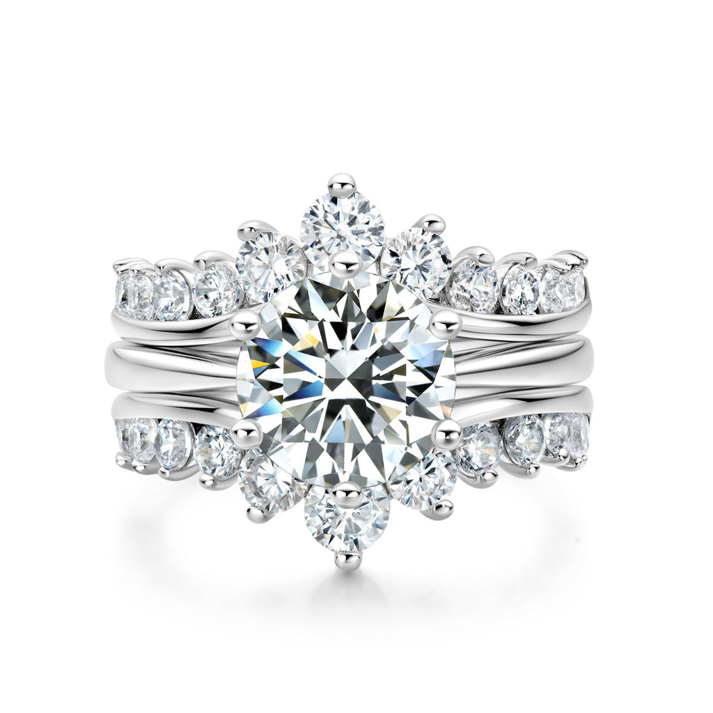 Front view of 3 carat round moissanite cathedral engagement ring bridal set with enhancer bands showcasing brilliant sparkle.