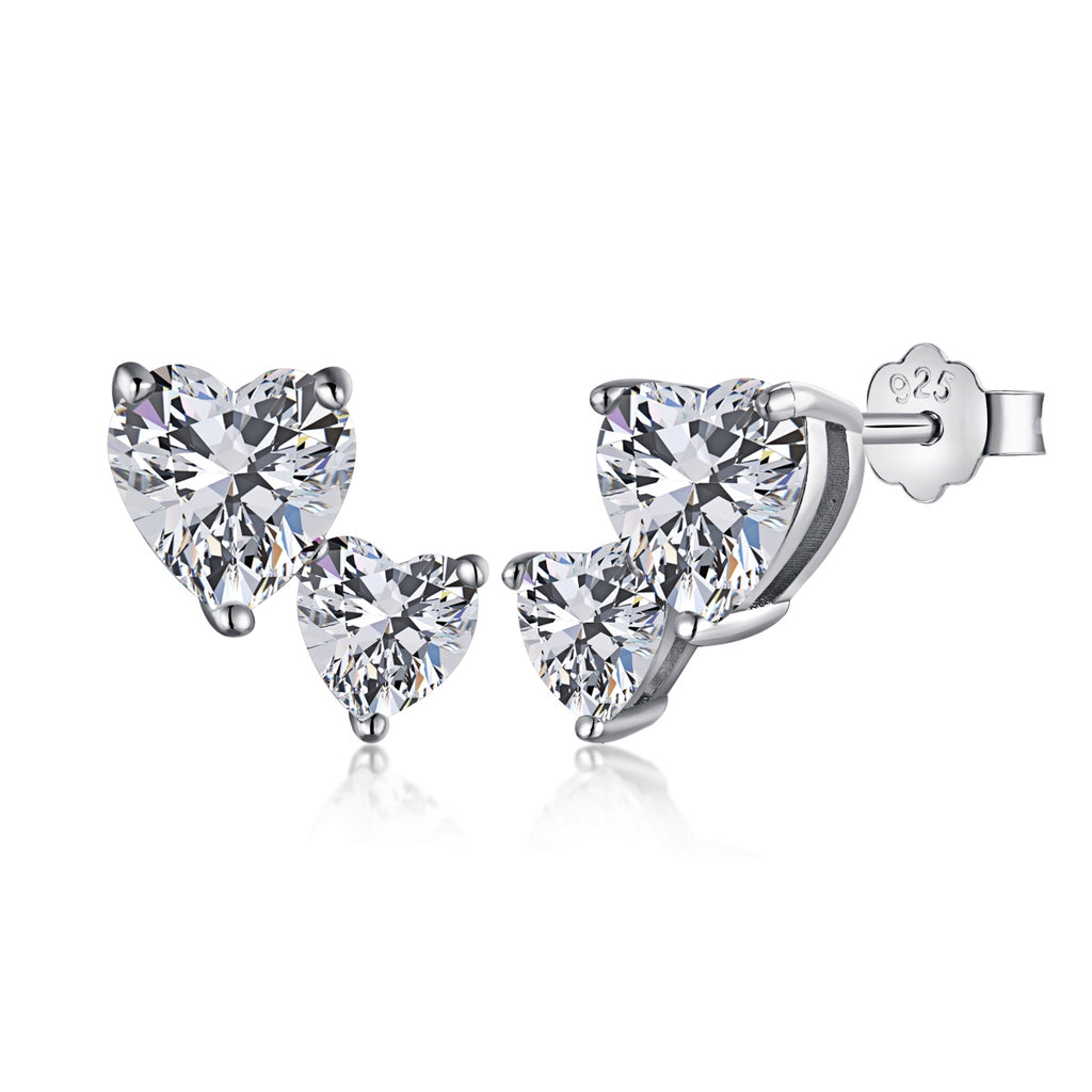 These elegant stud earrings sparkle with two heart-shaped cubic zirconia stones in an unexpected angle setting. Add a touch of modernity to a timeless design with these beautiful pieces - the perfect gift for a special someone or yourself.