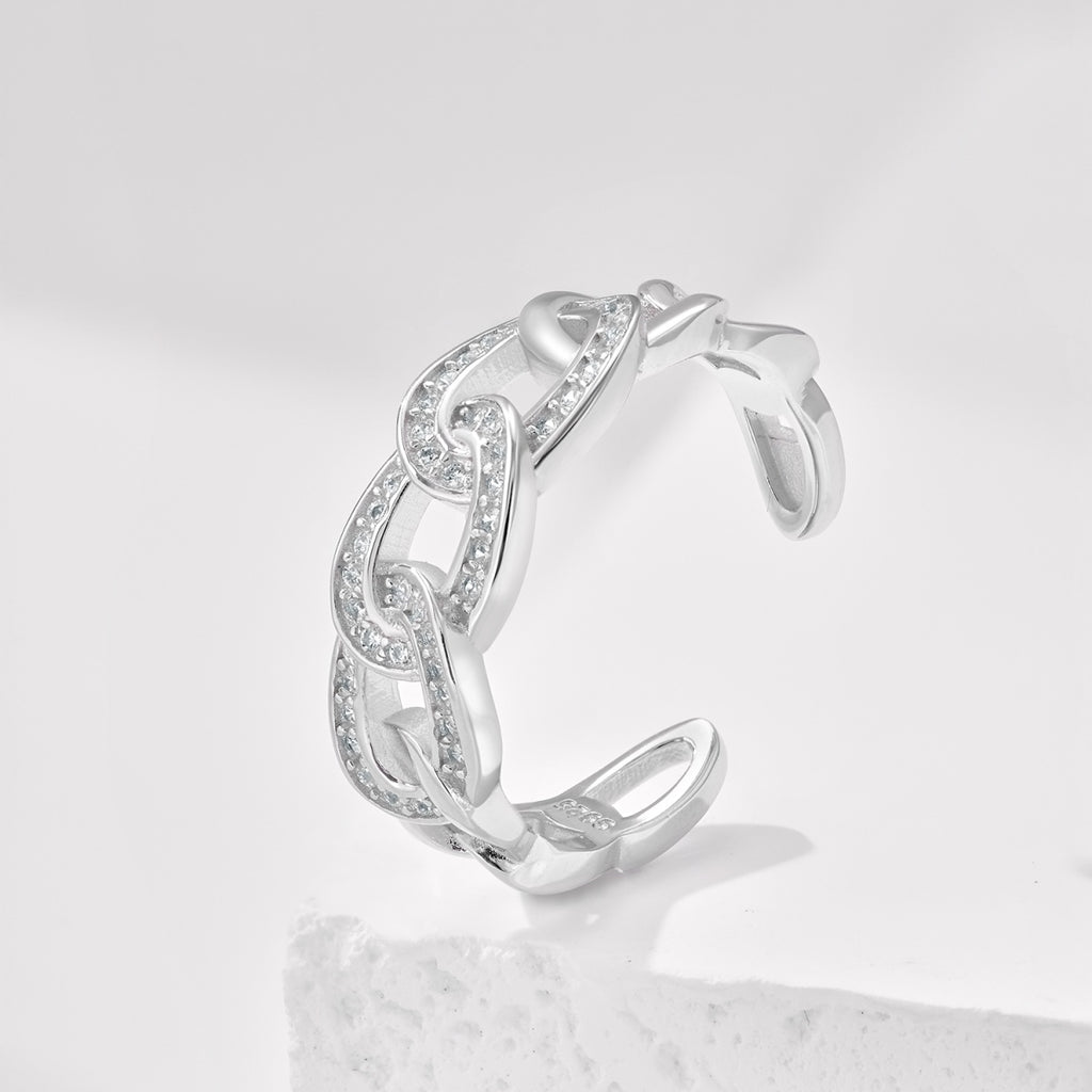 This on-trend chain link pave ring will take any look to the next level, boasting just the right amount of dazzling cubic zirconia crystals on a wide adjustable silver band.