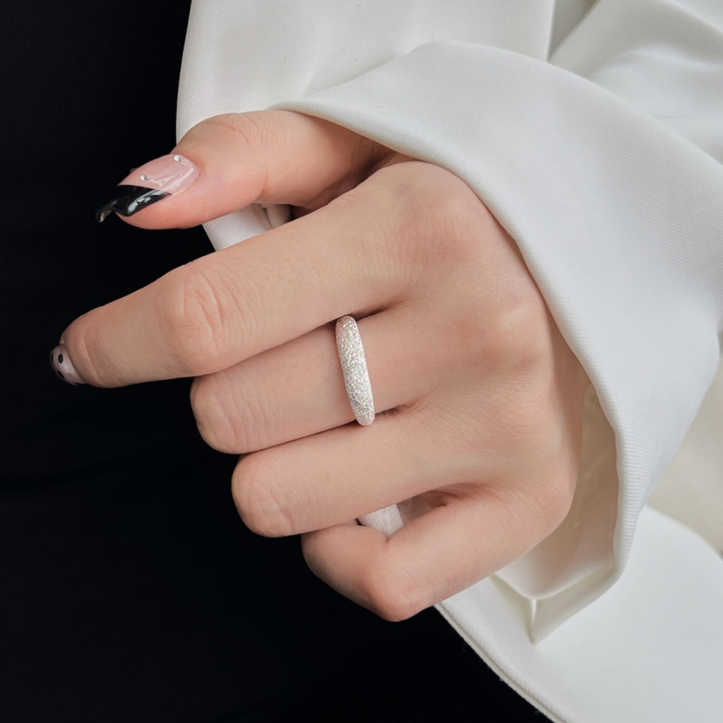 Simple, Shimmering and Stunning!   A classic thin dome ring with a sand casting / sandstone finish. Slip it on solo for minimalistic aesthetic, or stack it with your other faves for a statement-making look.