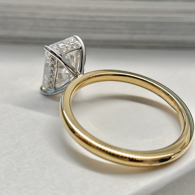 Close-up of Club Lux Radiant Cut Two Tone Engagement Ring showing hidden halo, prongs, and dual metal design – 18K Gold and Rhodium Plated, 8A Cubic Zirconia