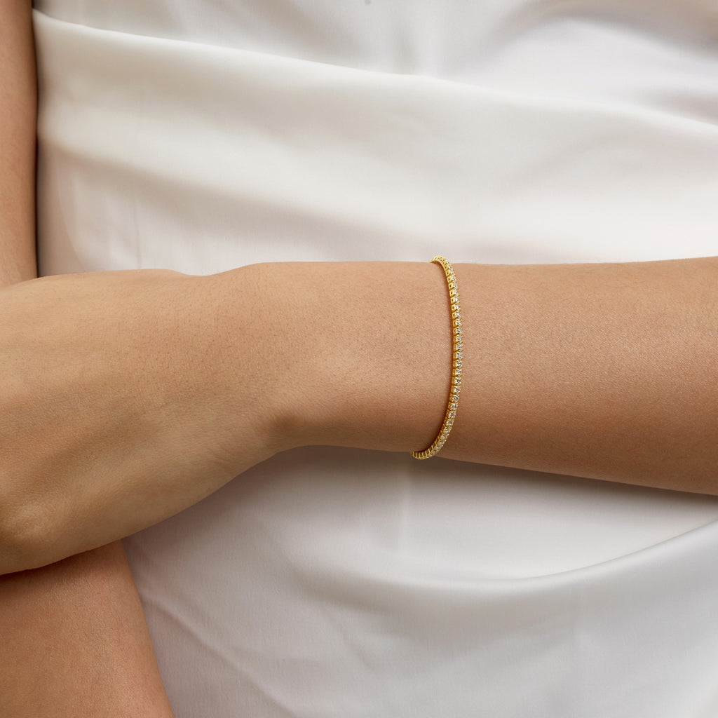 Elegant Pose with Woman Wearing Dainty Tennis Bracelet – Perfect for Everyday or Special Occasions