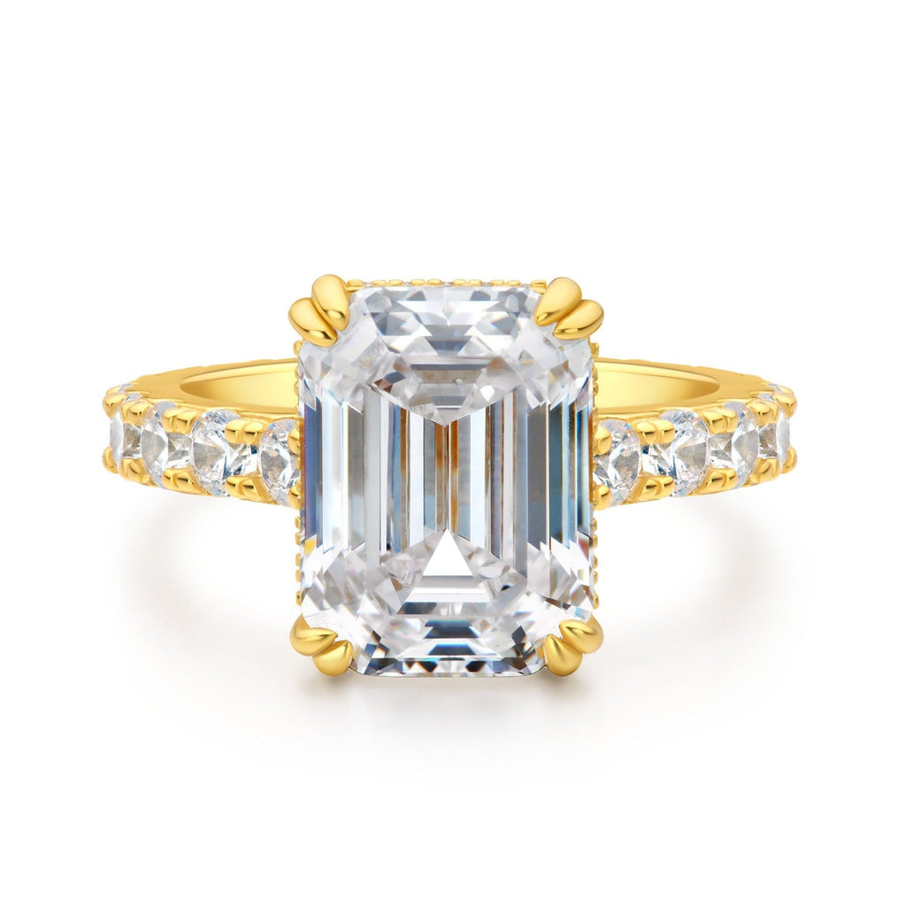 Club Lux 5ct emerald cut engagement ring front view on white background, hidden halo, cathedral setting, full eternity band