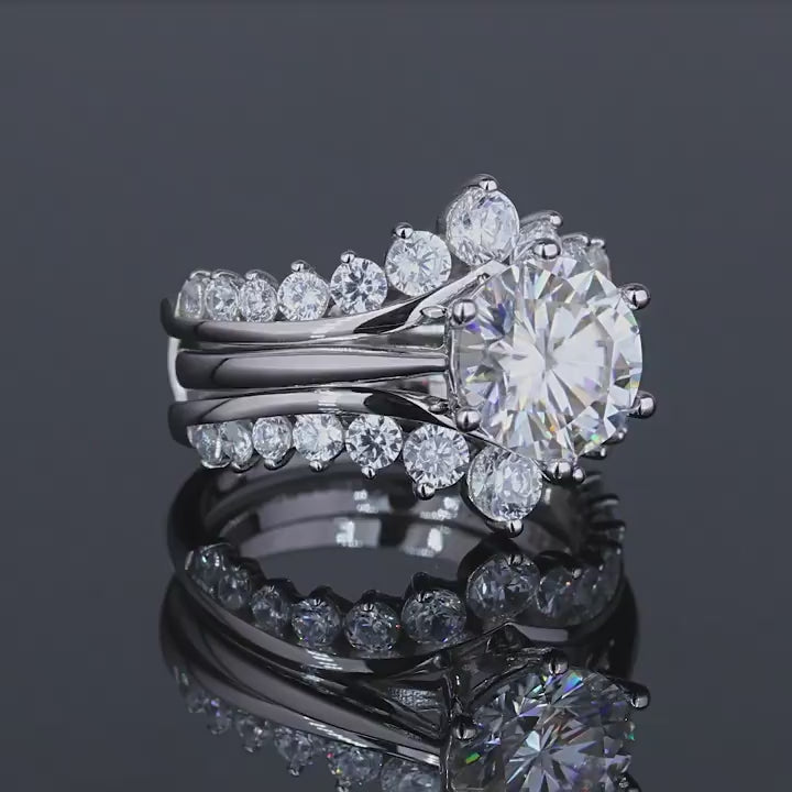 360 degree view video of 3 carat round moissanite cathedral engagement ring bridal set showing all angles and details.